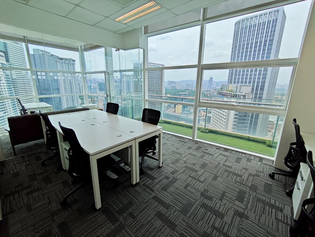 Corner office with KL skyline